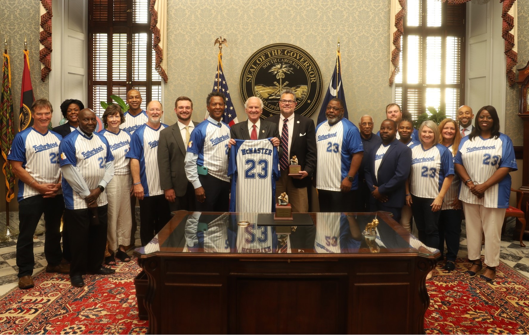South Carolina Center for Fathers and Families presents Governor Henry McMaster with fatherhood award